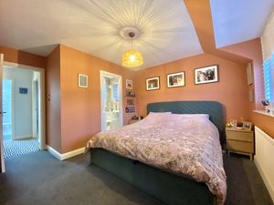 Bedroom One- click for photo gallery